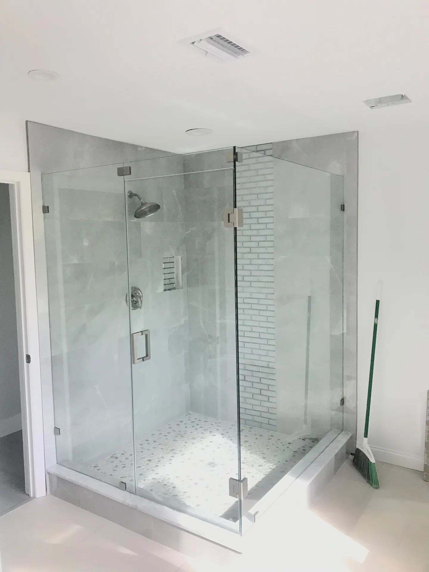 Detailed frameless shower renovation by FLO