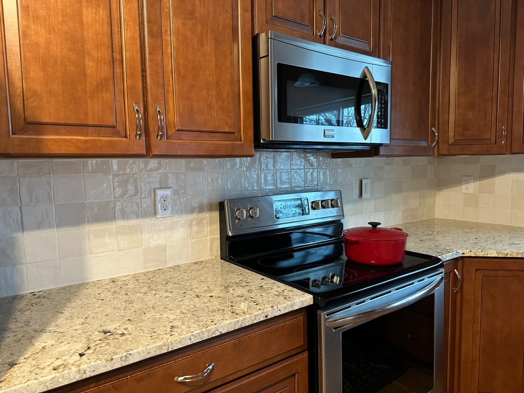 Granite countertop and tile backsplash installation